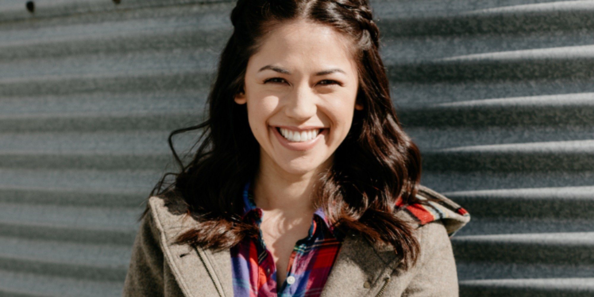 Molly Yeh smiles in a photograph, she stars in Food Network's "Girl Meets Farm."