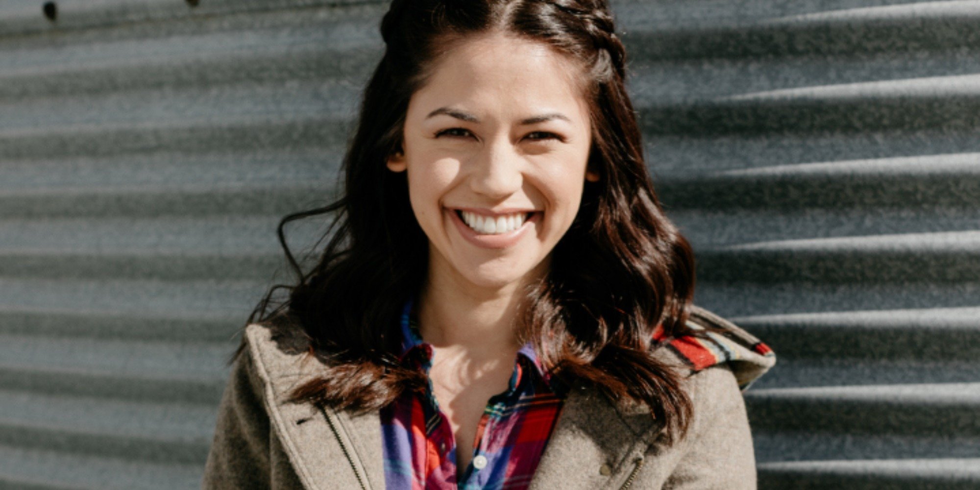 Molly Yeh smiles in a photo she stars in Food Network's 