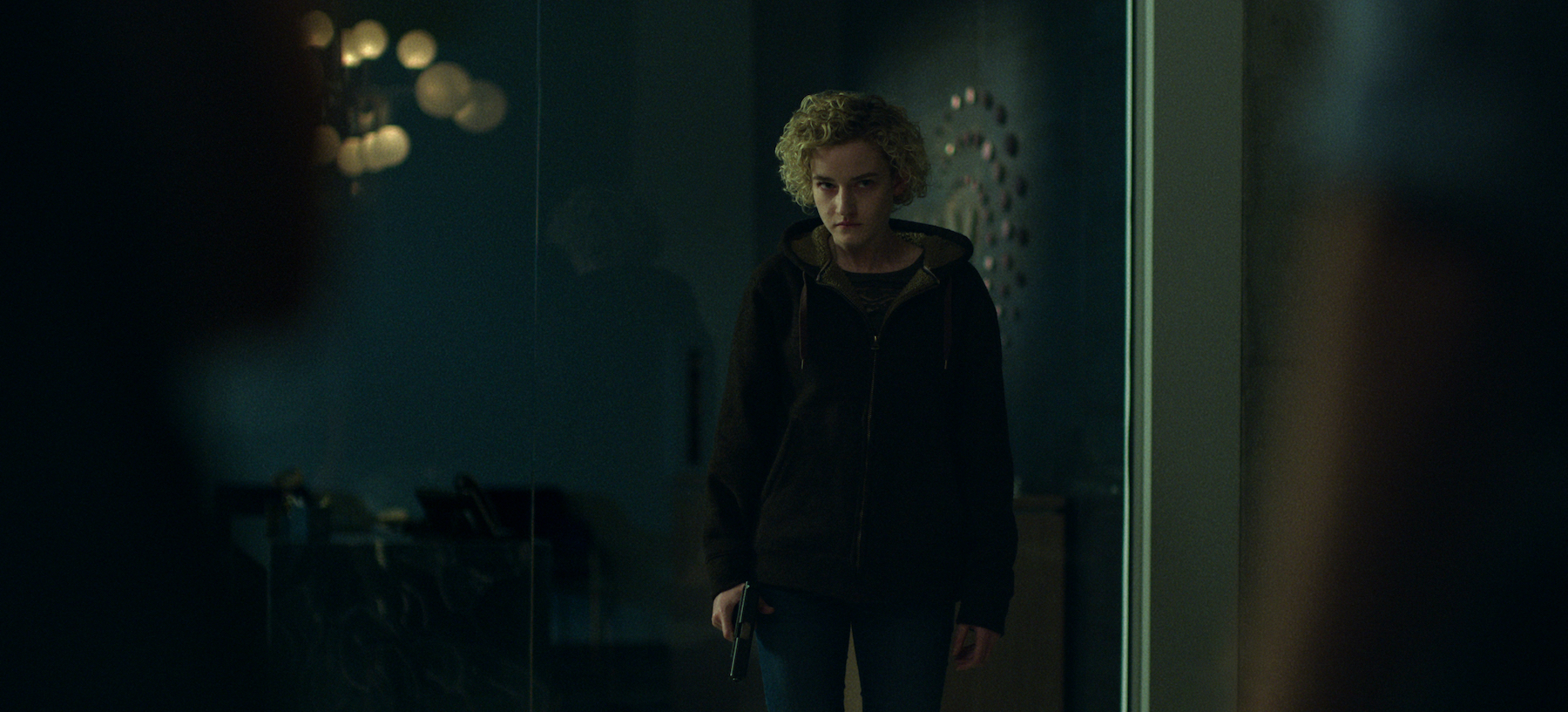 Ruth Langmore (Julia Garner) stands in Clare Shaw's office in the final season of 'Ozark'