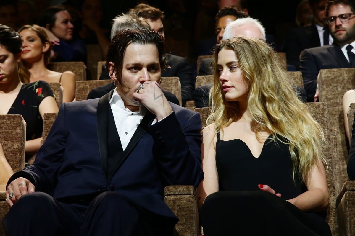 Johnny Depp and Amber Heard attend a premiere for 'Black Mass' during their marriage