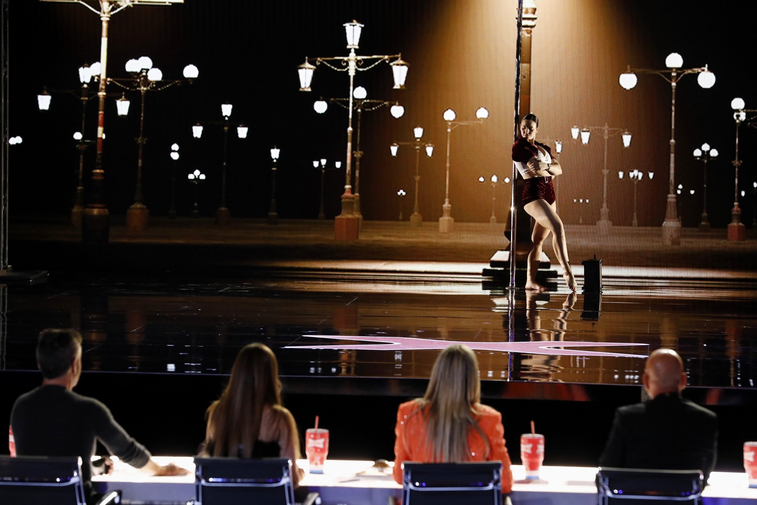 'AGT' Season 17 audition of pole dancer Kristy Sellars standing against a lamp post