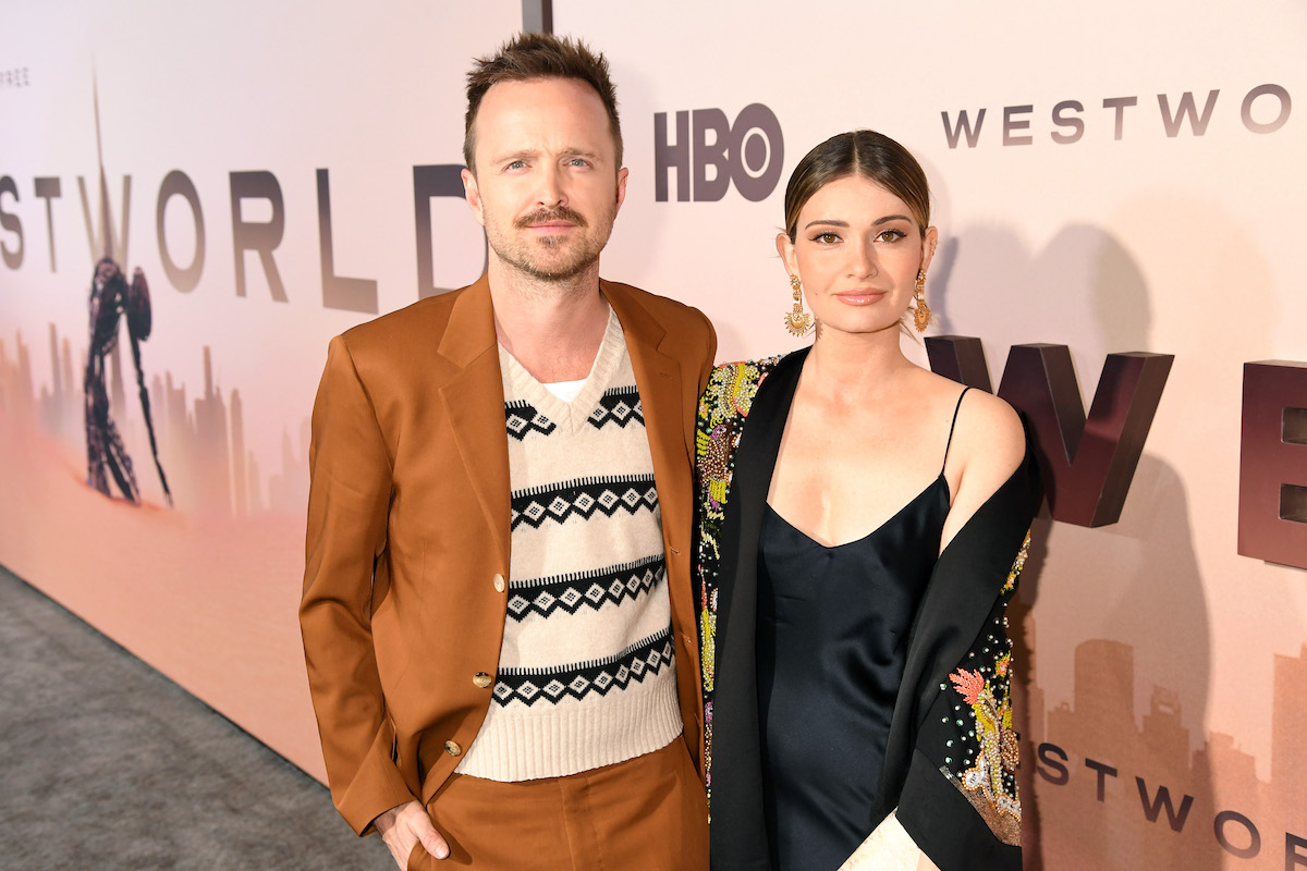 Aaron Paul and Lauren Parsekian pose for cameras at the Season 3 premiere of the HBO drama series Westworld