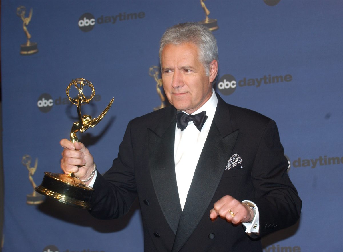 'Jeopardy!' host Alex Trebek shows off his Daytime Emmy statuette in 2006.