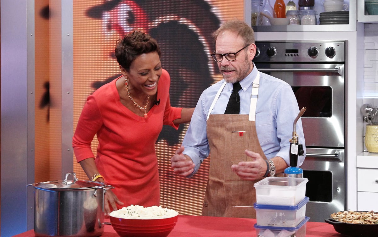 Alton Brown, right, prepares a meal with morning show host Robin Roberts.