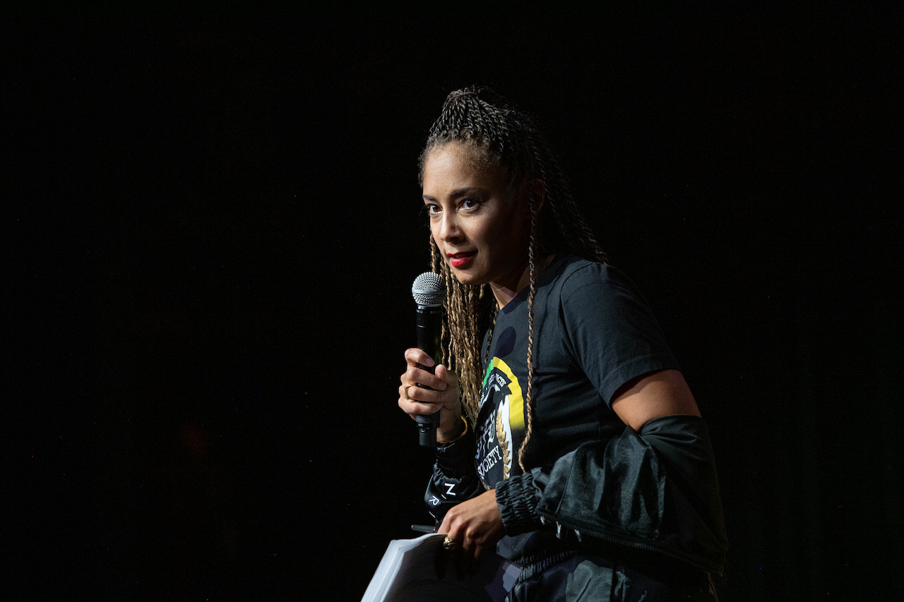 Amanda Seales on stage at comedy show; Seales recently reacted to being left out of 'The Real' series finale