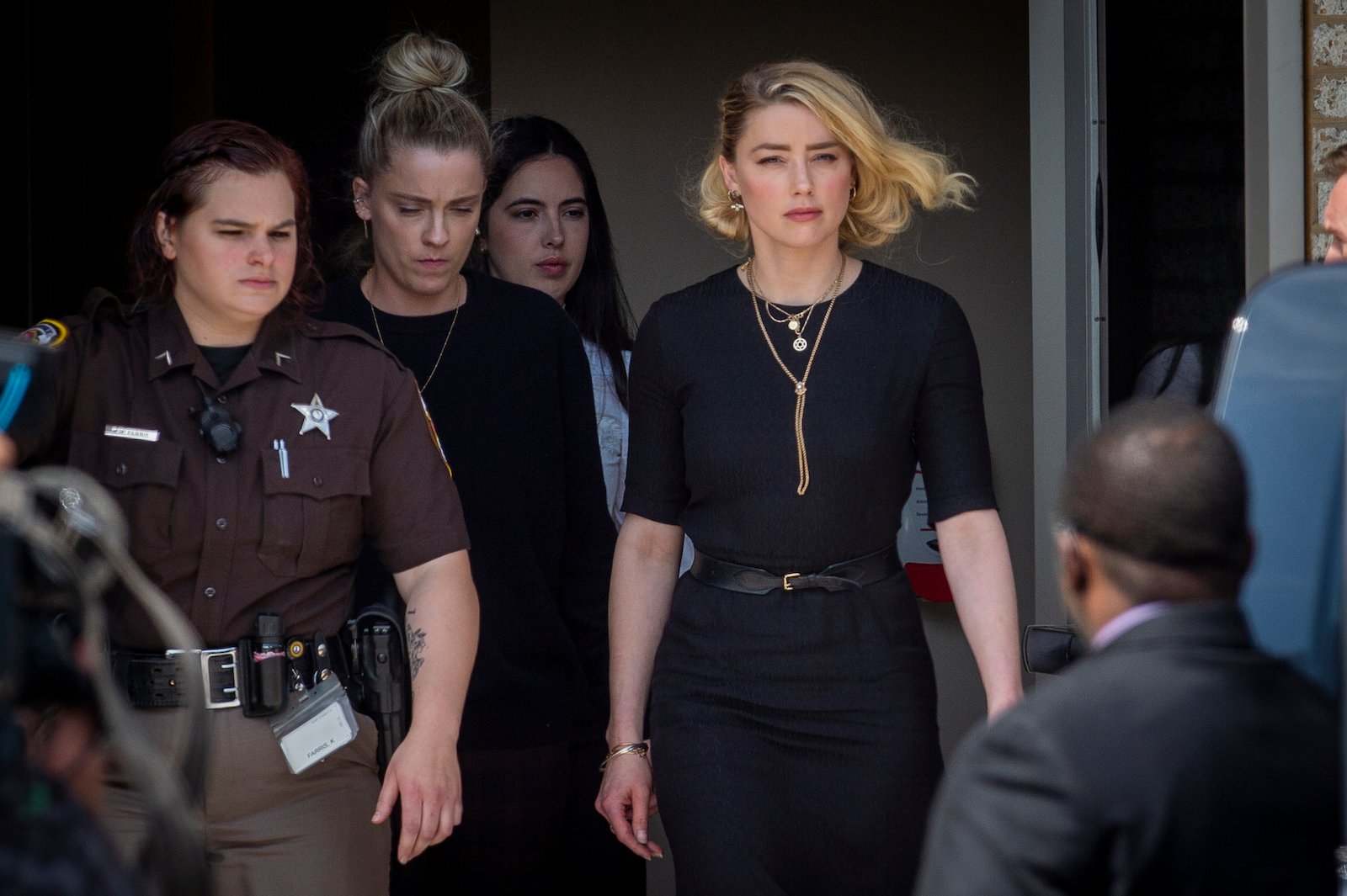 Amber Heard walking with her sister out of the courtroom after the trial against Johnny Depp