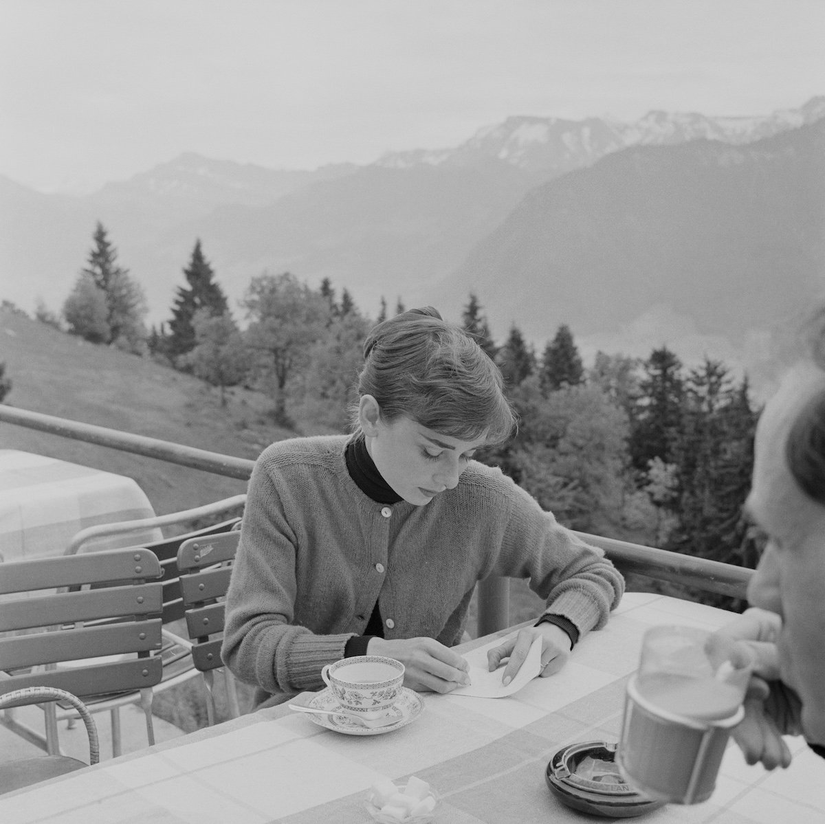 Actress Audrey Hepburn with her husband, American actor Mel Ferrer on the terrace of the Restaurant Hammetschwand at the summit of the Bürgenstock, Switzerland in 1955