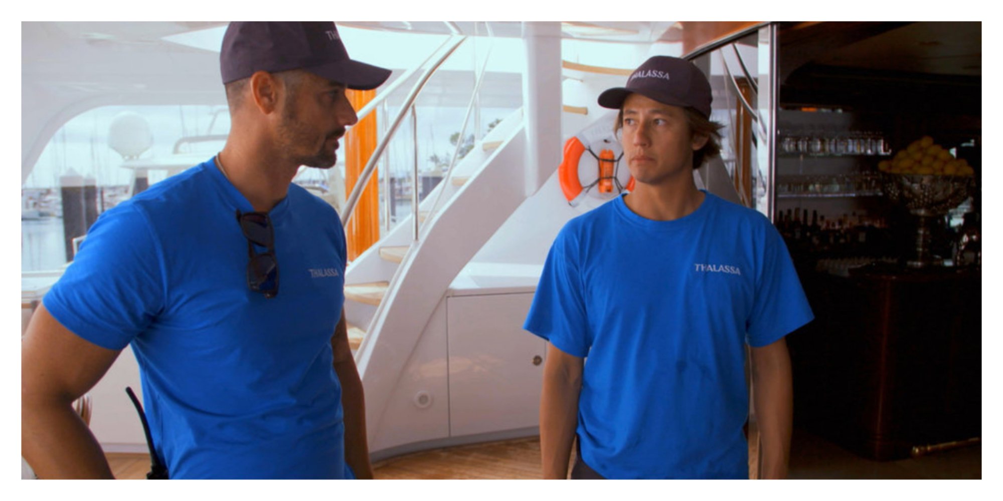 Jamie Sayed and Benny Crawley look at each other on deck on 'Below Deck Down Under'