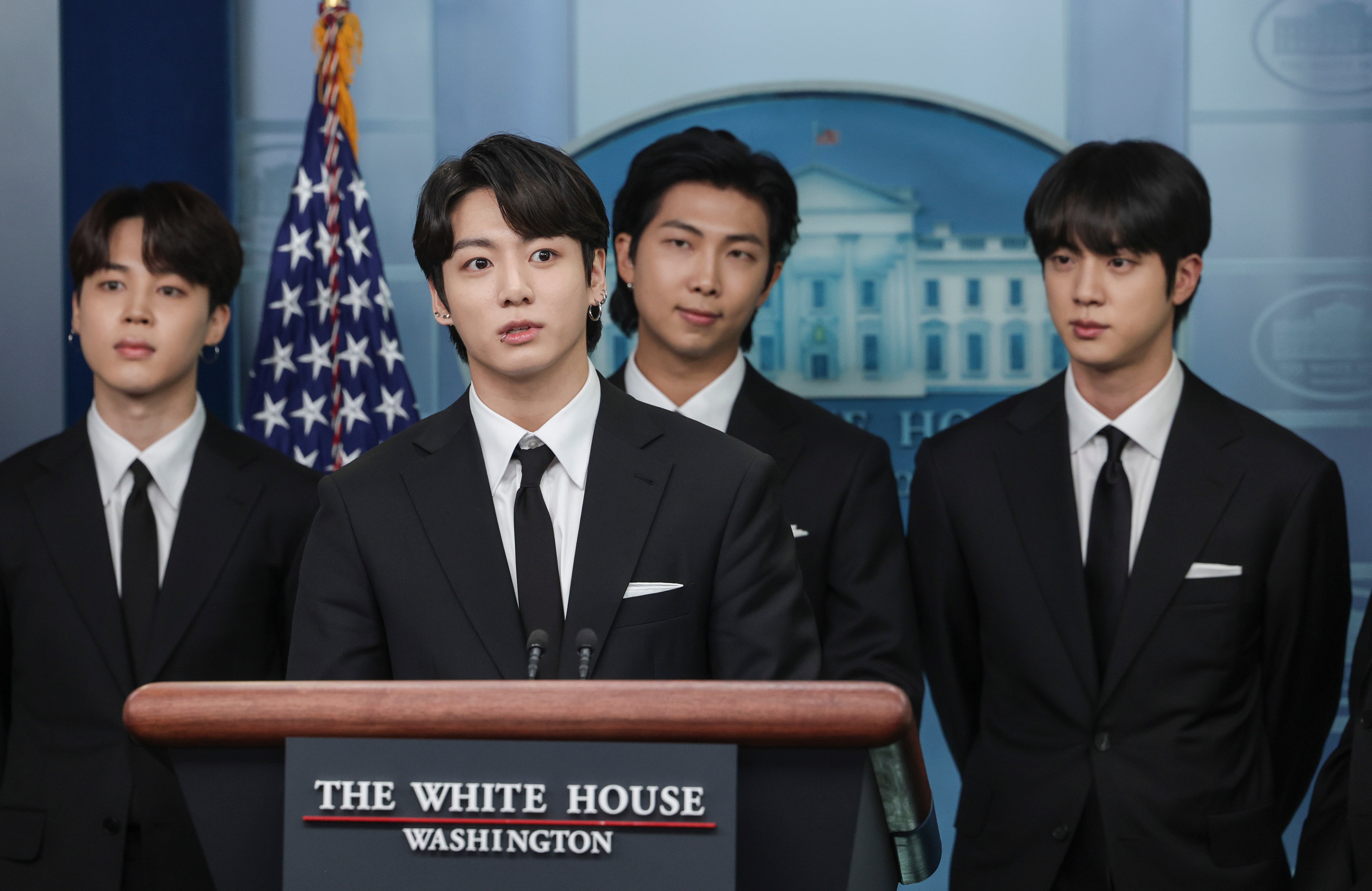 Jimin, Jungkook, RM, and Jin of the pop group BTS speak at the White House
