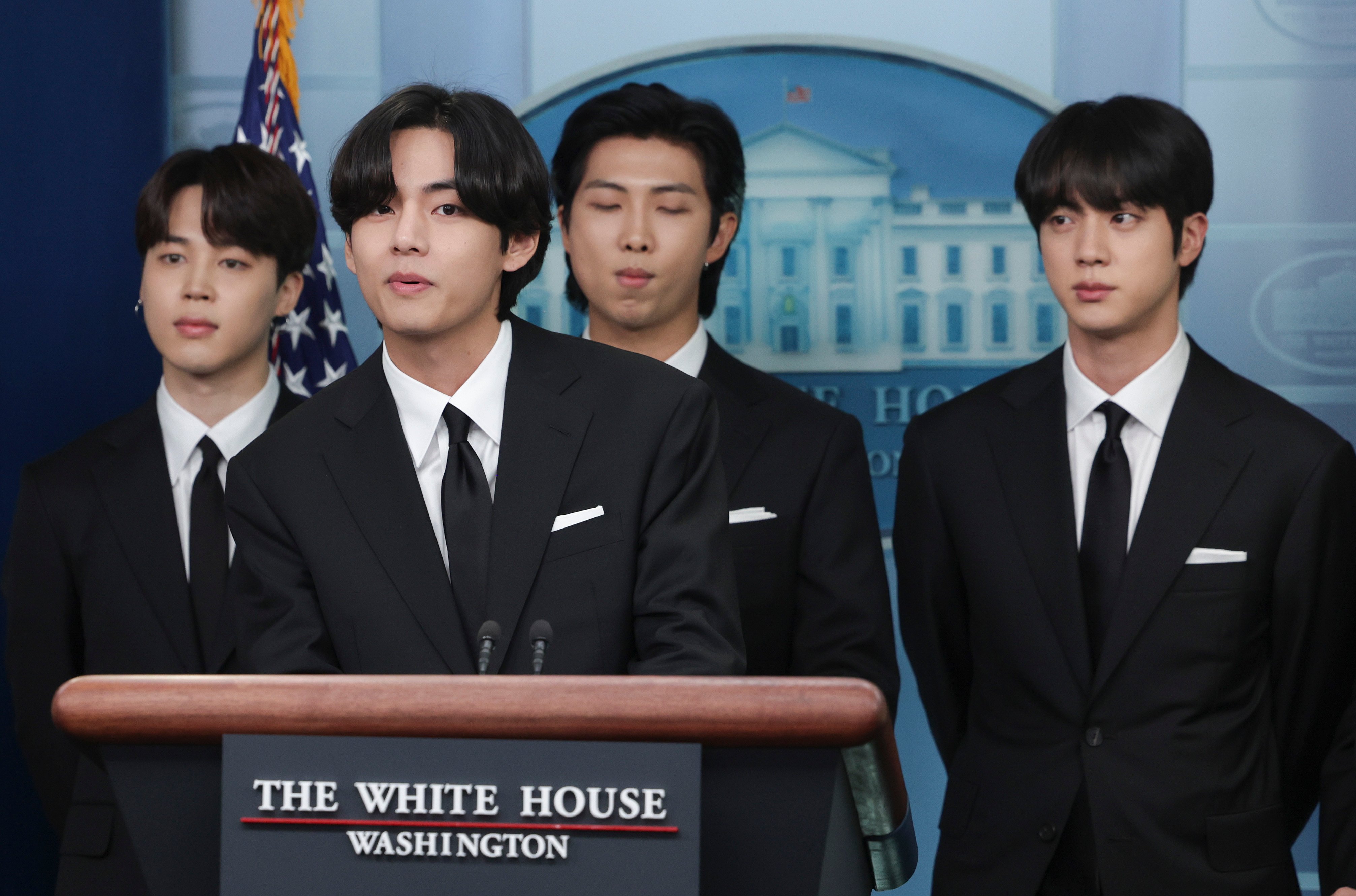 Jimin, V, RM, and Jin of BTS speak at the daily press briefing at the White House