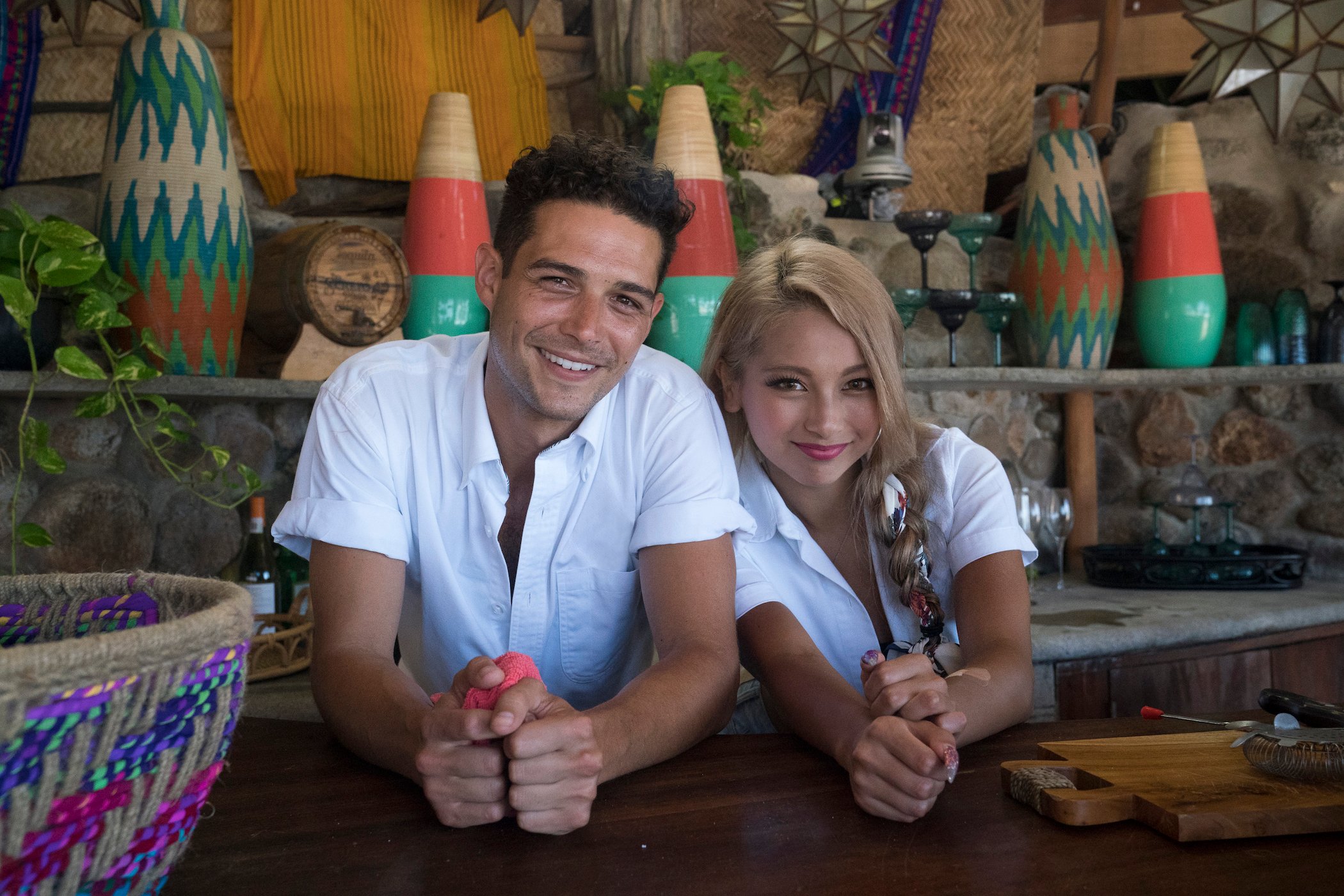 Wells Adams and Yuki Kimura standing at the bar in 'Bachelor in Paradise.' Wells Adams returns to bartend in 'Bachelor in Paradise' Season 8