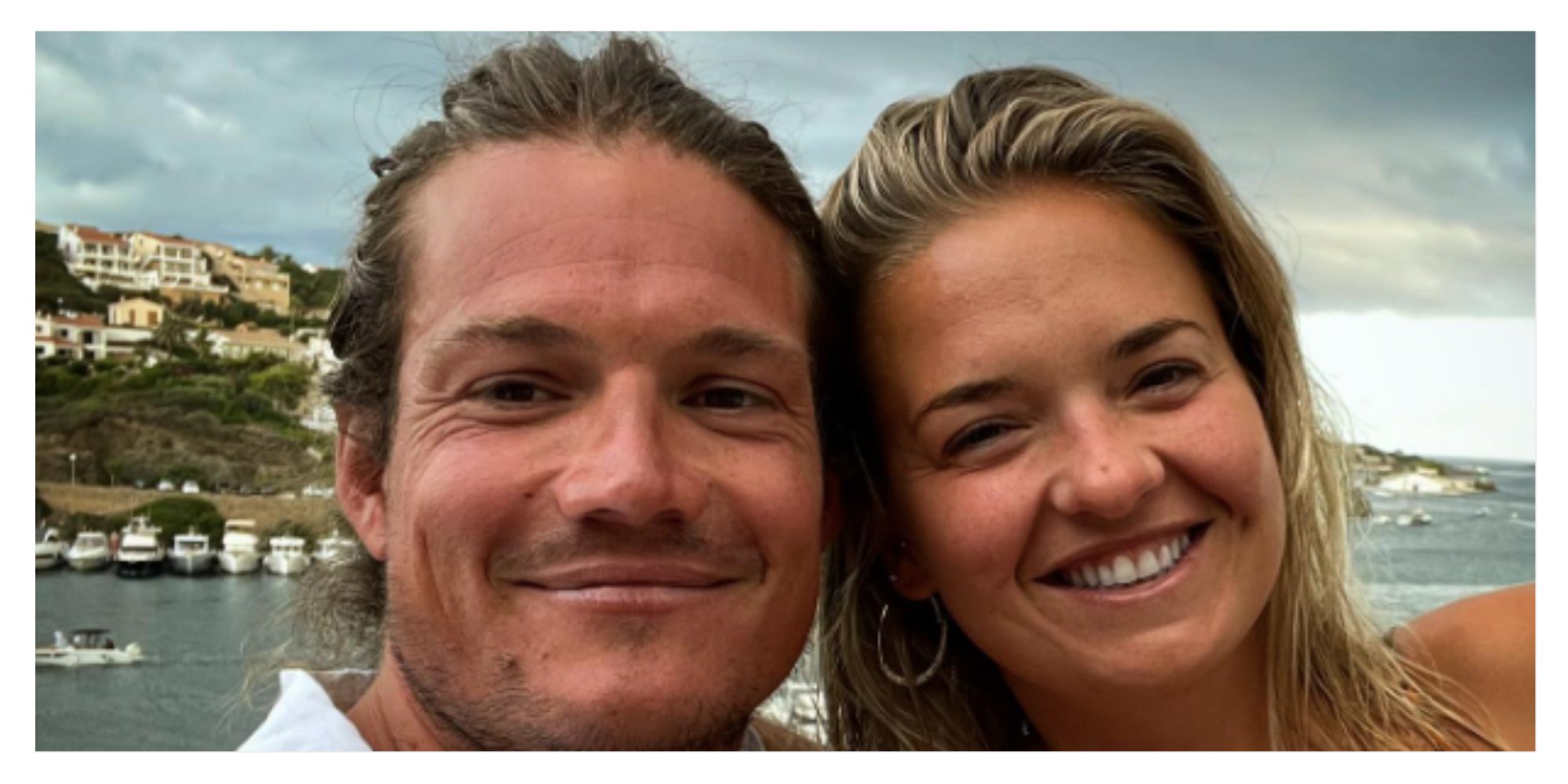 Gary King and Daisy Kelliher from 'Below Deck Sailing Yacht' smile for a photo.