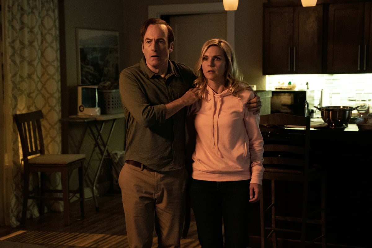 The final episodes of Better Call Saul are almost here. Kim and Jimmy stand in their living room looking shocked. 