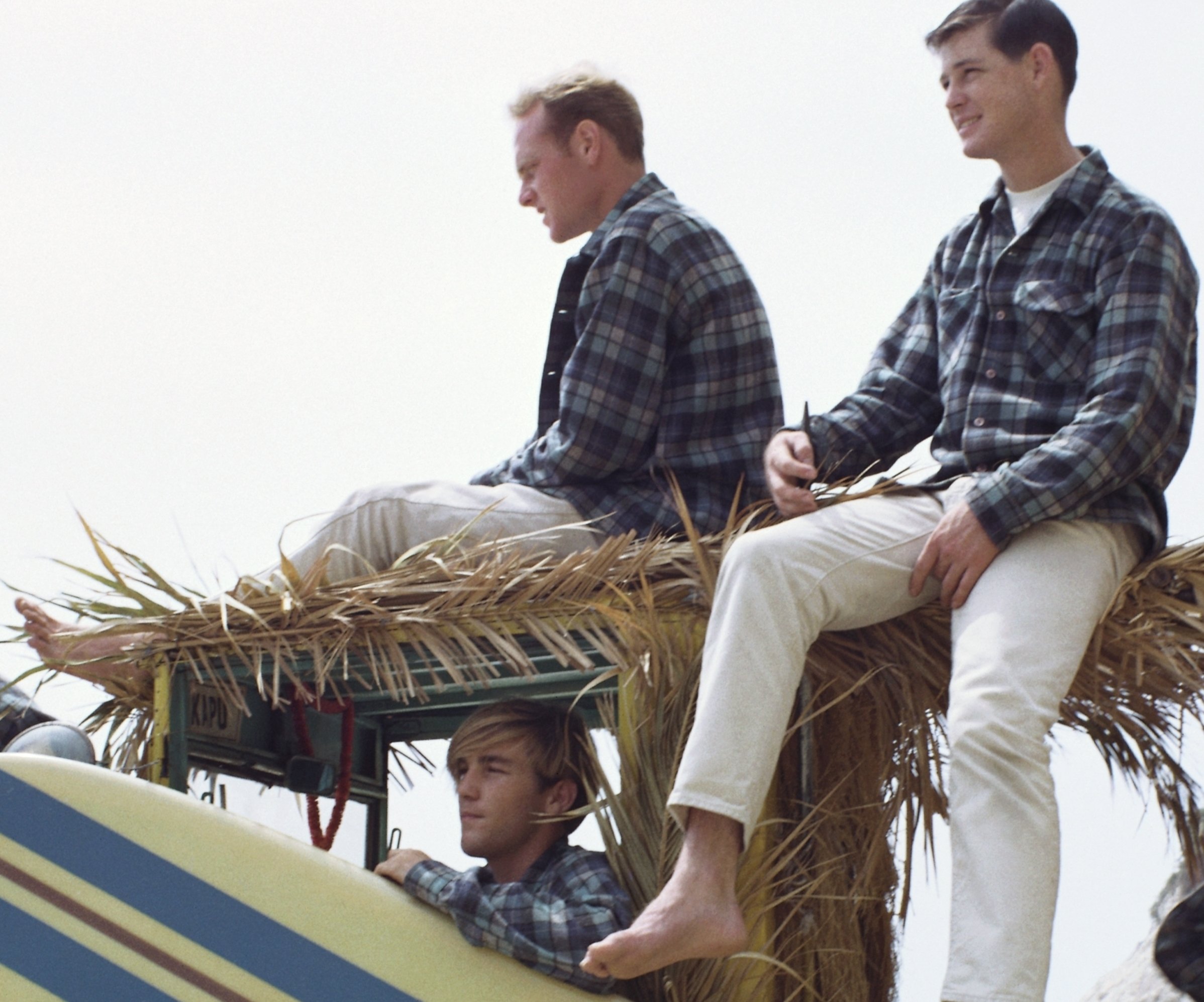 The Beach Boys with a surf board