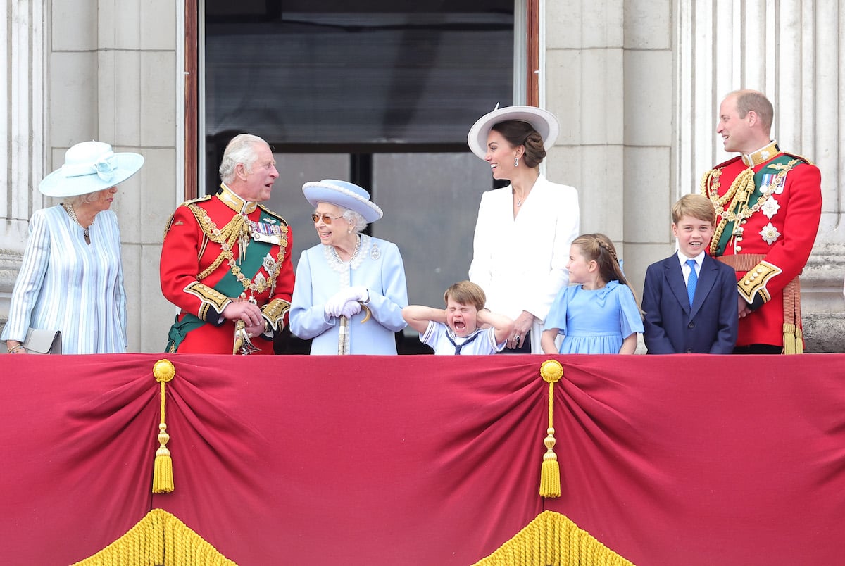 Camilla Parker Bowles, Prince Charles, Queen Elizabeth II Prince Louis, Kate Middleton, Princess Charlotte, Prince George, and Prince William on the balcony of Buckingham Palace