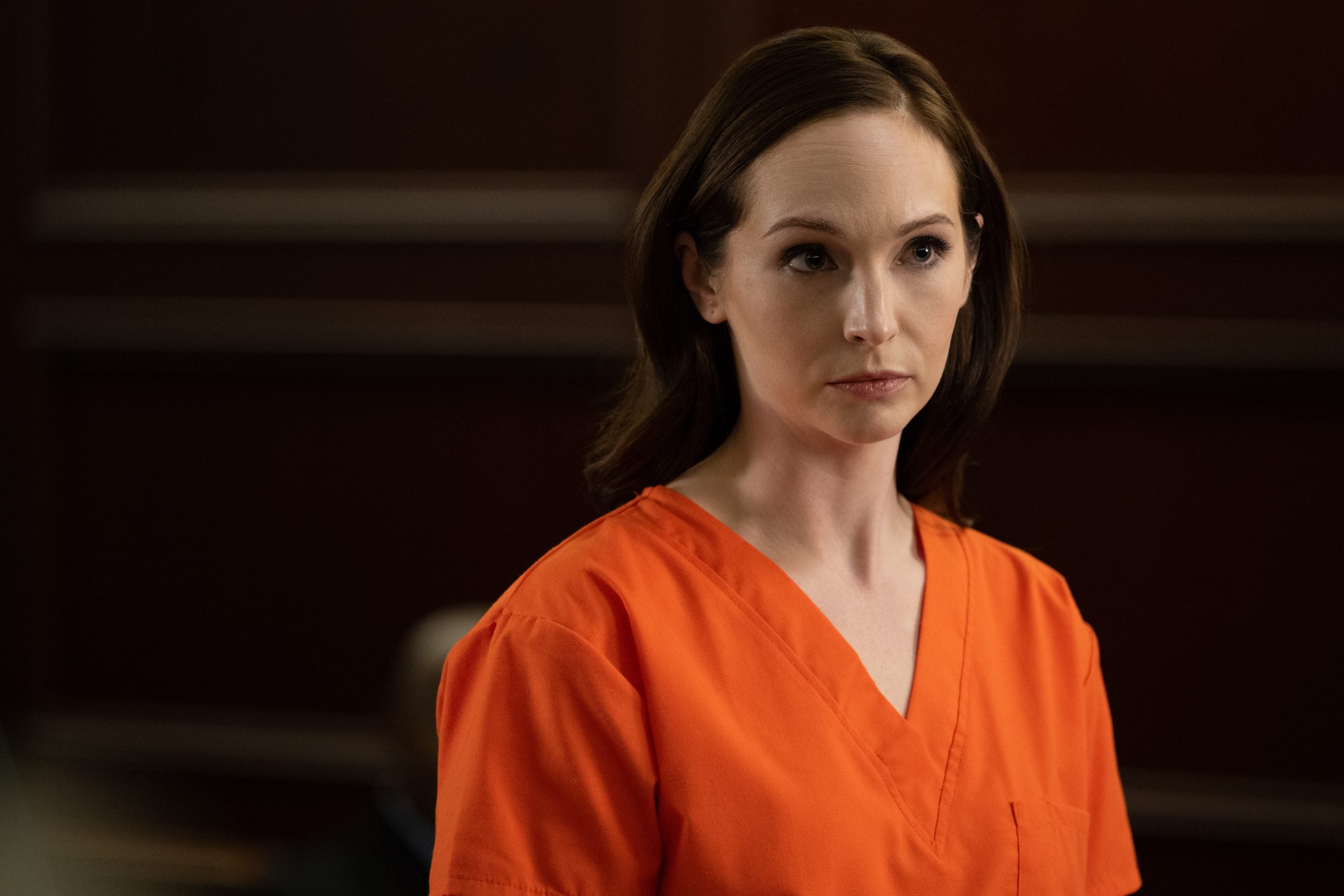 Candice King as Melanie McGuire wearing an orange prison jumpsuit in 'Suitcase Killer: The Melanie McGuire Story'