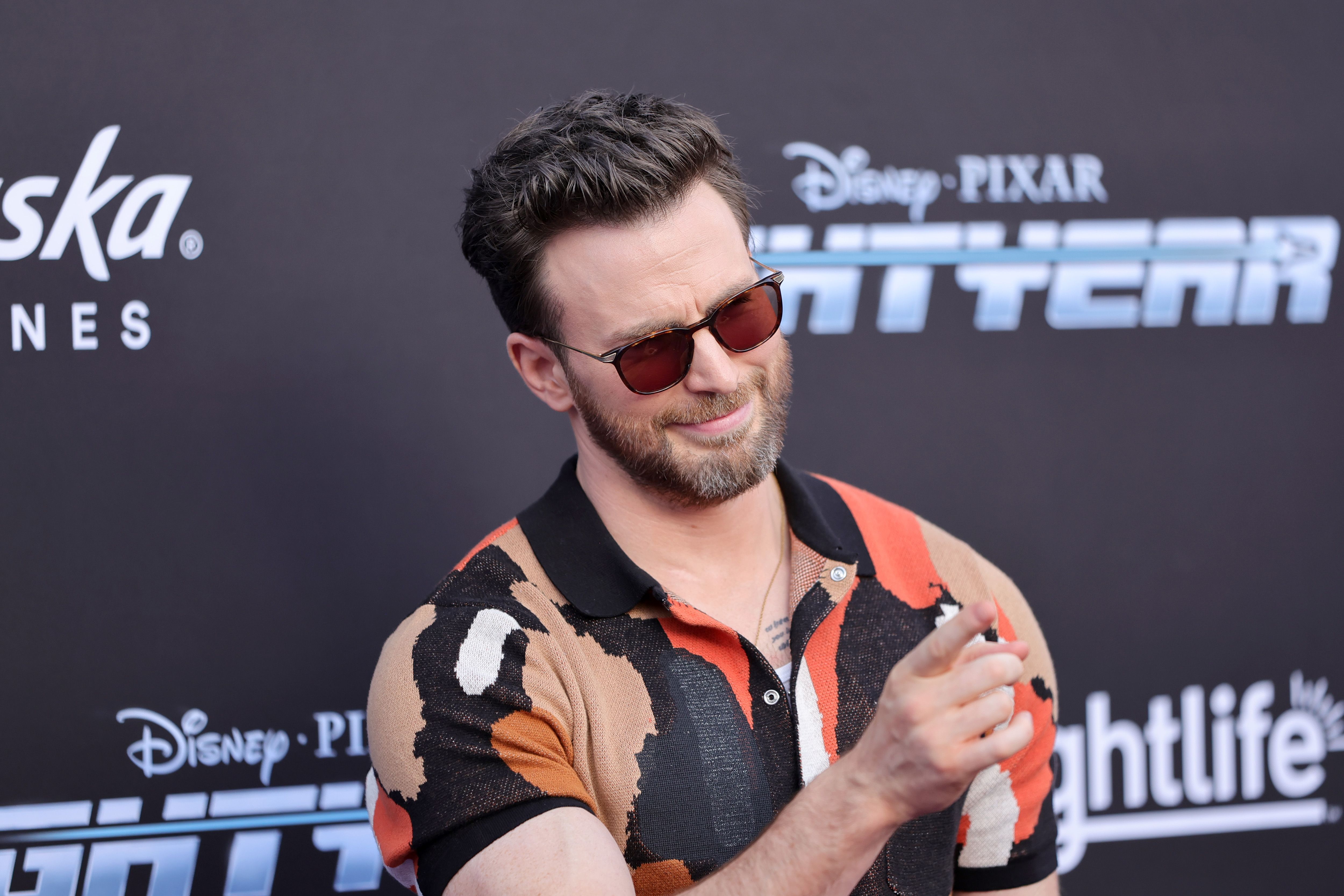 Chris Evans attends the premiere of the Disney and Pixar movie Lightyear at the El Capitan Theatre