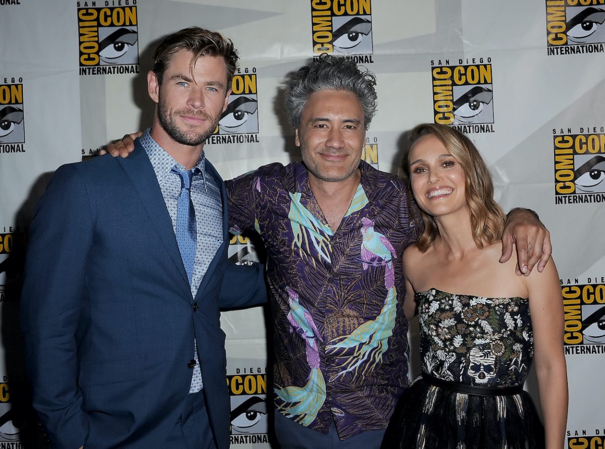 Chris Hemsworth (from left), Taika Waititi, and Natalie Portman at San Diego Comic-Con in 2019. Five Oscar winners join Hemsworth in 'Thor: Love and Thunder,' including Waititi and Portman.