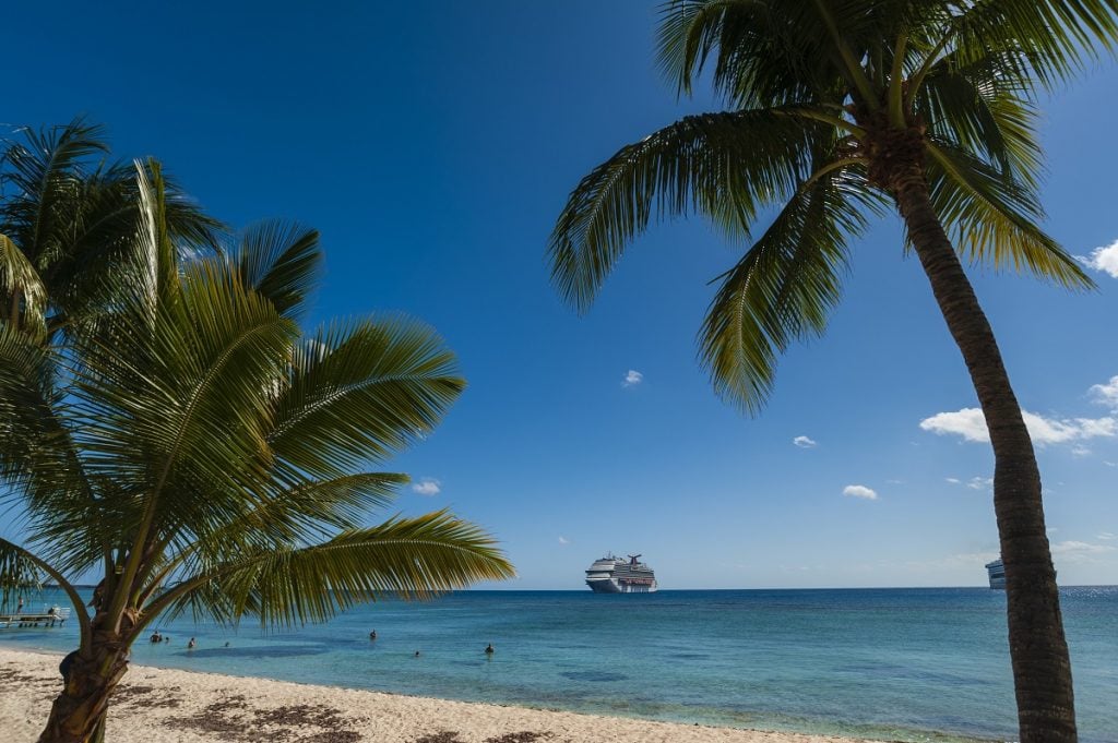 A cruise ship is seen anchored in the Caribbean Sea off of the Grand Cayman Islands