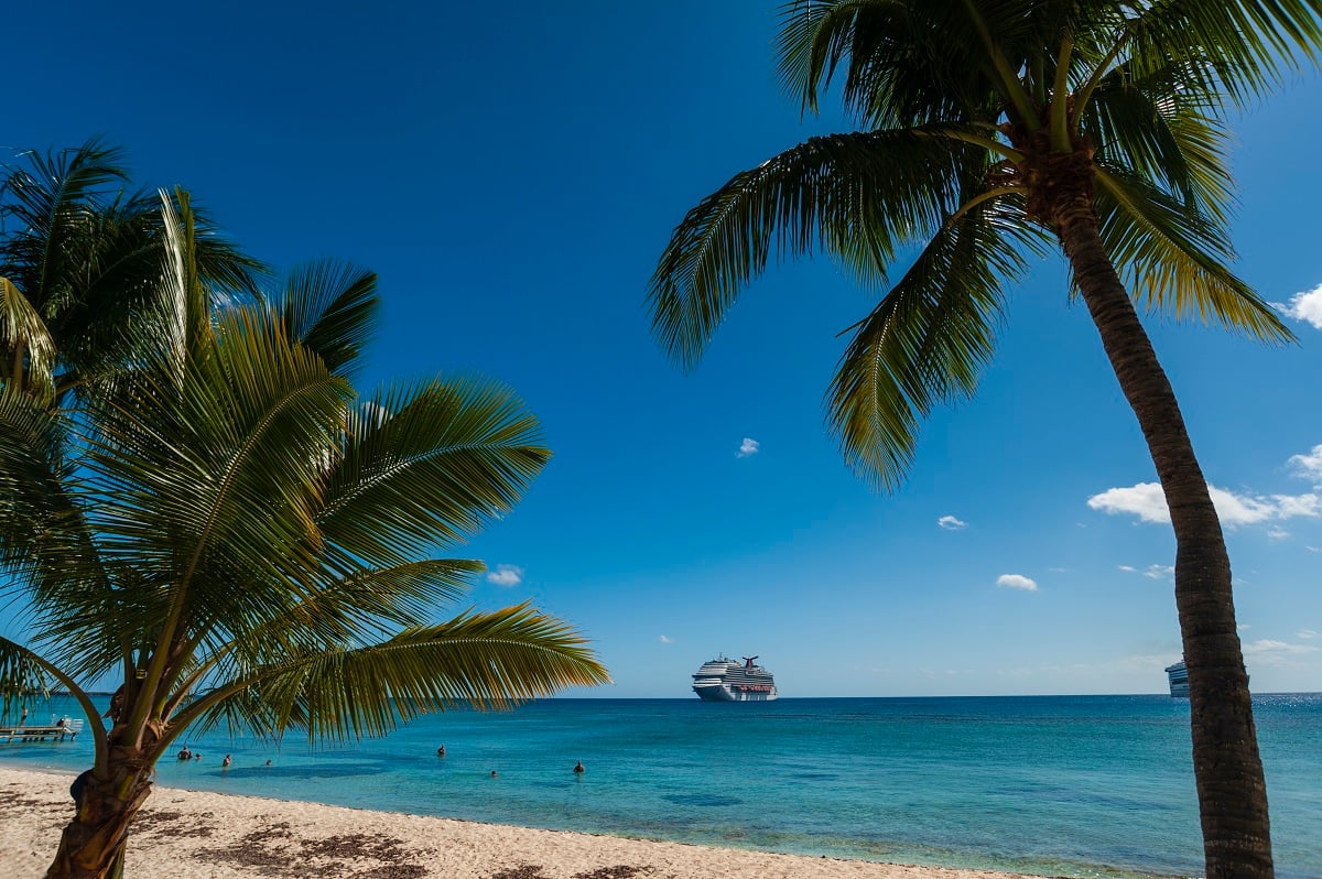 A cruise ship is seen anchored in the Caribbean Sea off of the Grand Cayman Islands