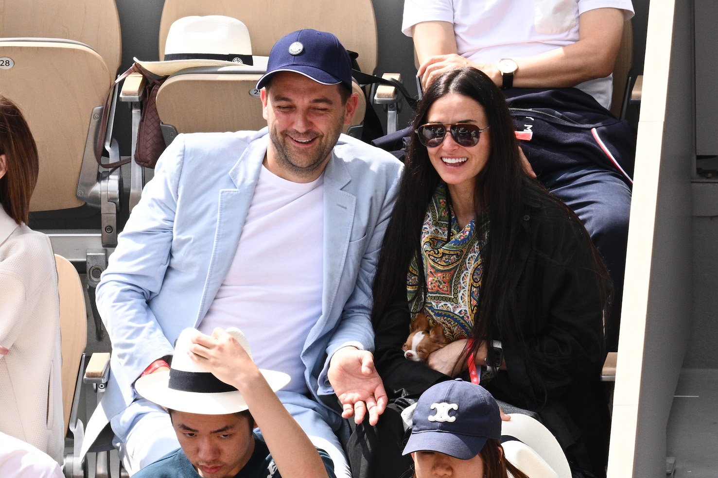 Chef Daniel Humm and Demi Moore sitting together at the French Open 2022