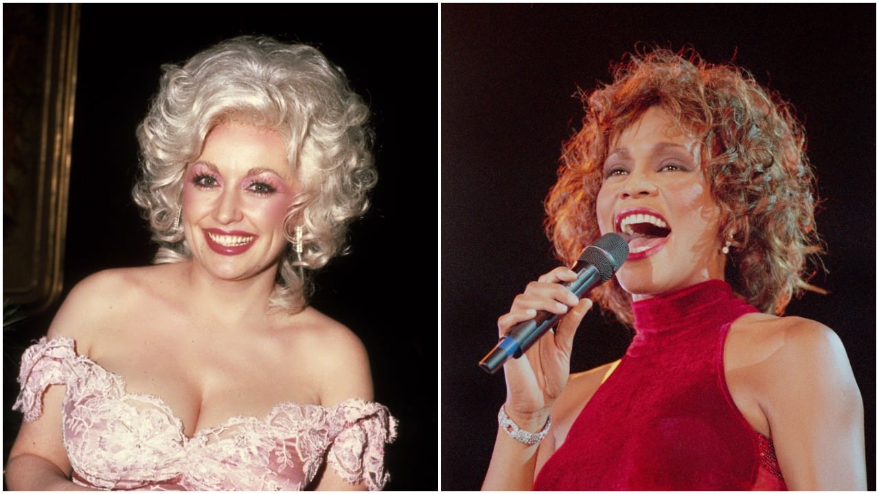 Dolly Parton wears a pink dress against a black background and Whitney Houston wears a red dress and holds a microphone.