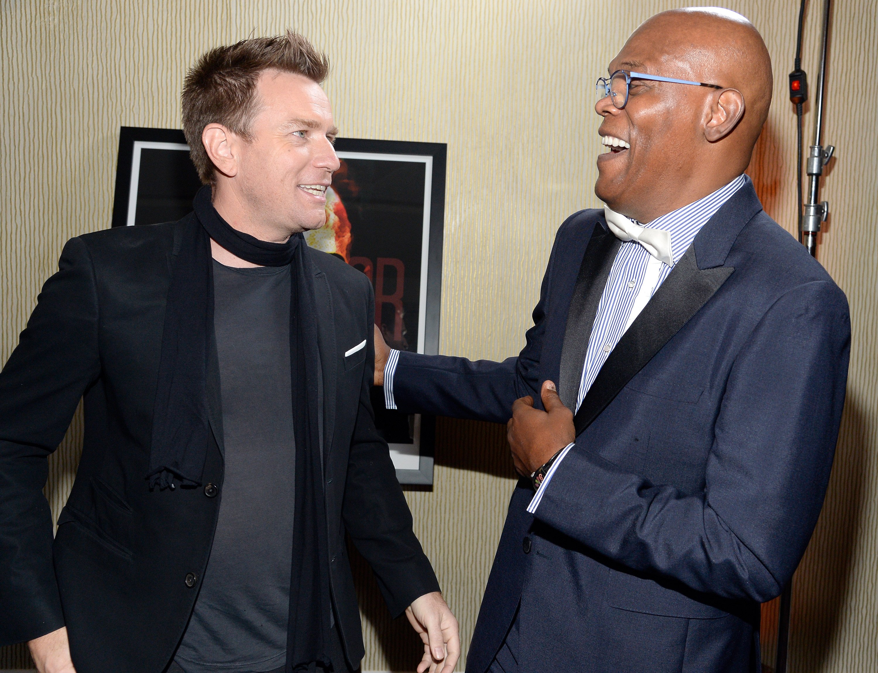 Obi-Wan Kenobi actor Ewan McGregor and Star Wars actor Samuel L. Jackson, who played Mace Windu, laughing together in 2016