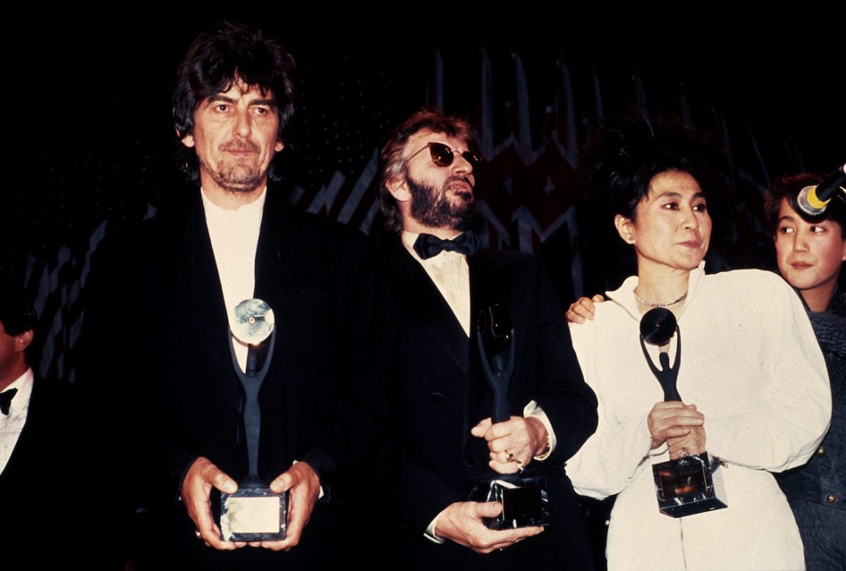 George Harrison, Ringo Starr, and Yoko Ono at The Beatles' Rock & Roll Hall of Fame induction in 1988.