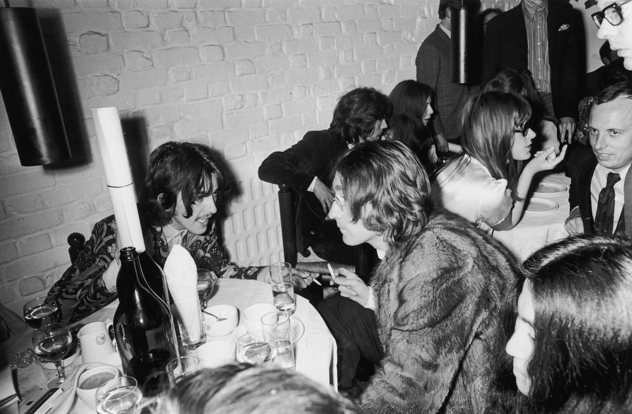 George Harrison and John Lennon at the opening of The Beatles' second shop in 1968.