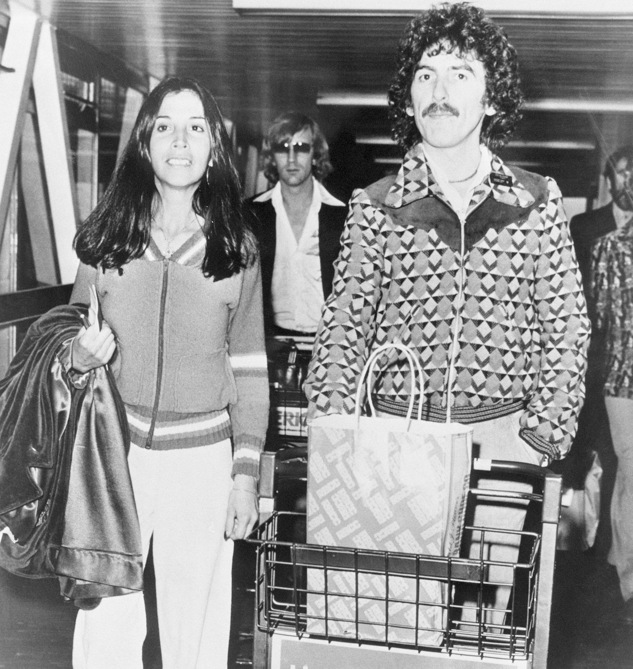 George Harrison and his wife Olivia at the airport in 1978.