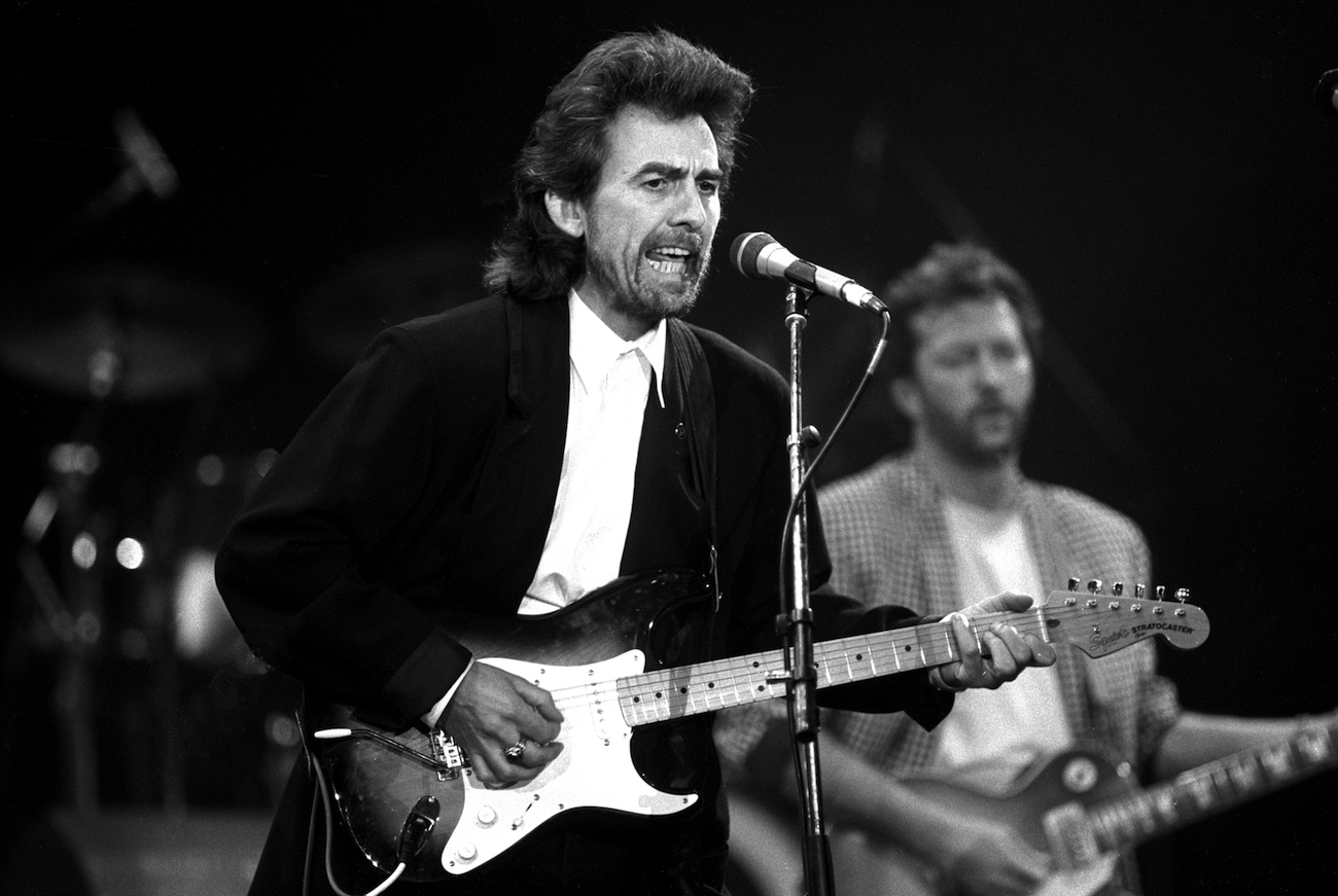 George Harrison playing electric guitar at the Prince's Trust Concert in 1987.