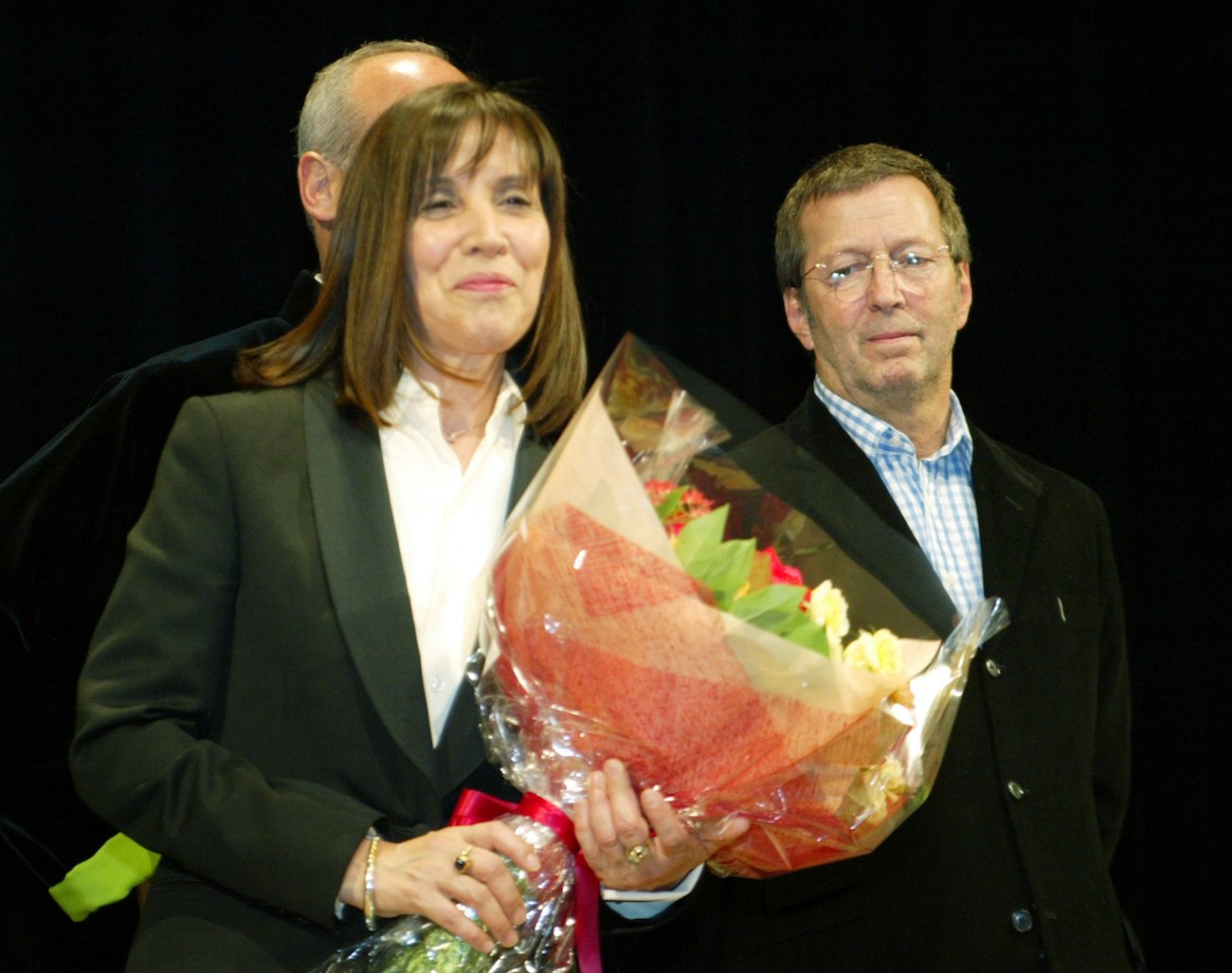 George Harrison's wife Olivia and Eric Clapton in 2003.