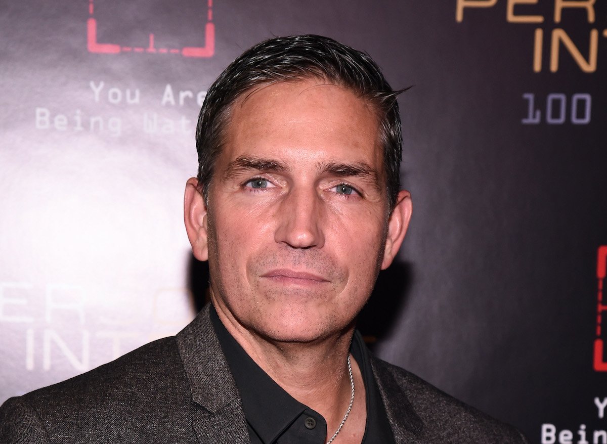 Jim Caviezel in front of a black background