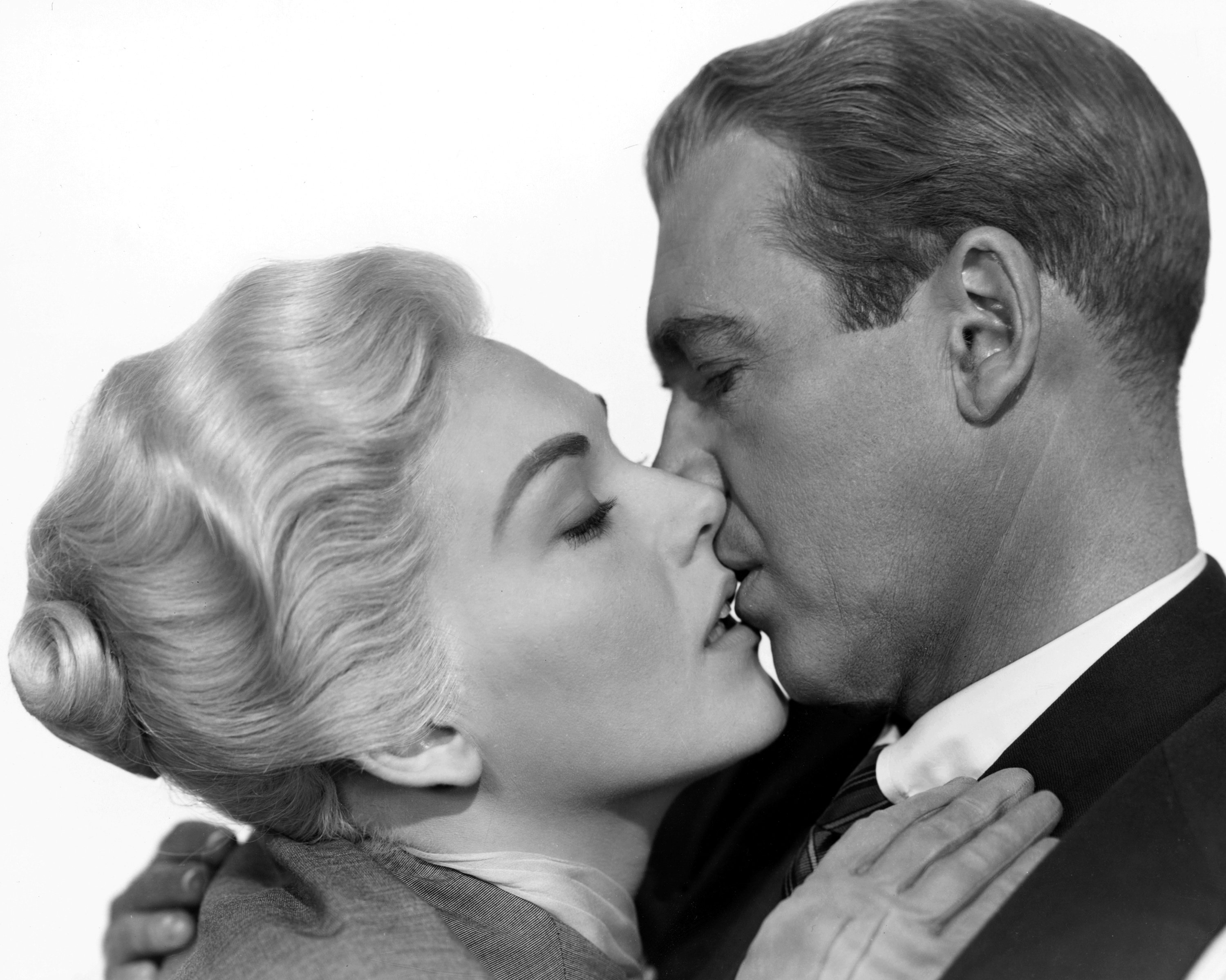 James Stewart and Kim Novak kissing