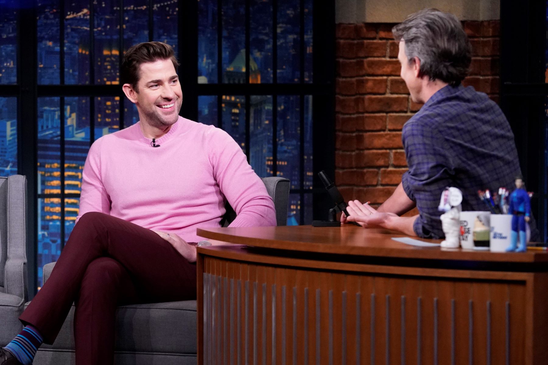 John Krasinski being interviewed on 'Late Night With Seth Meyers'