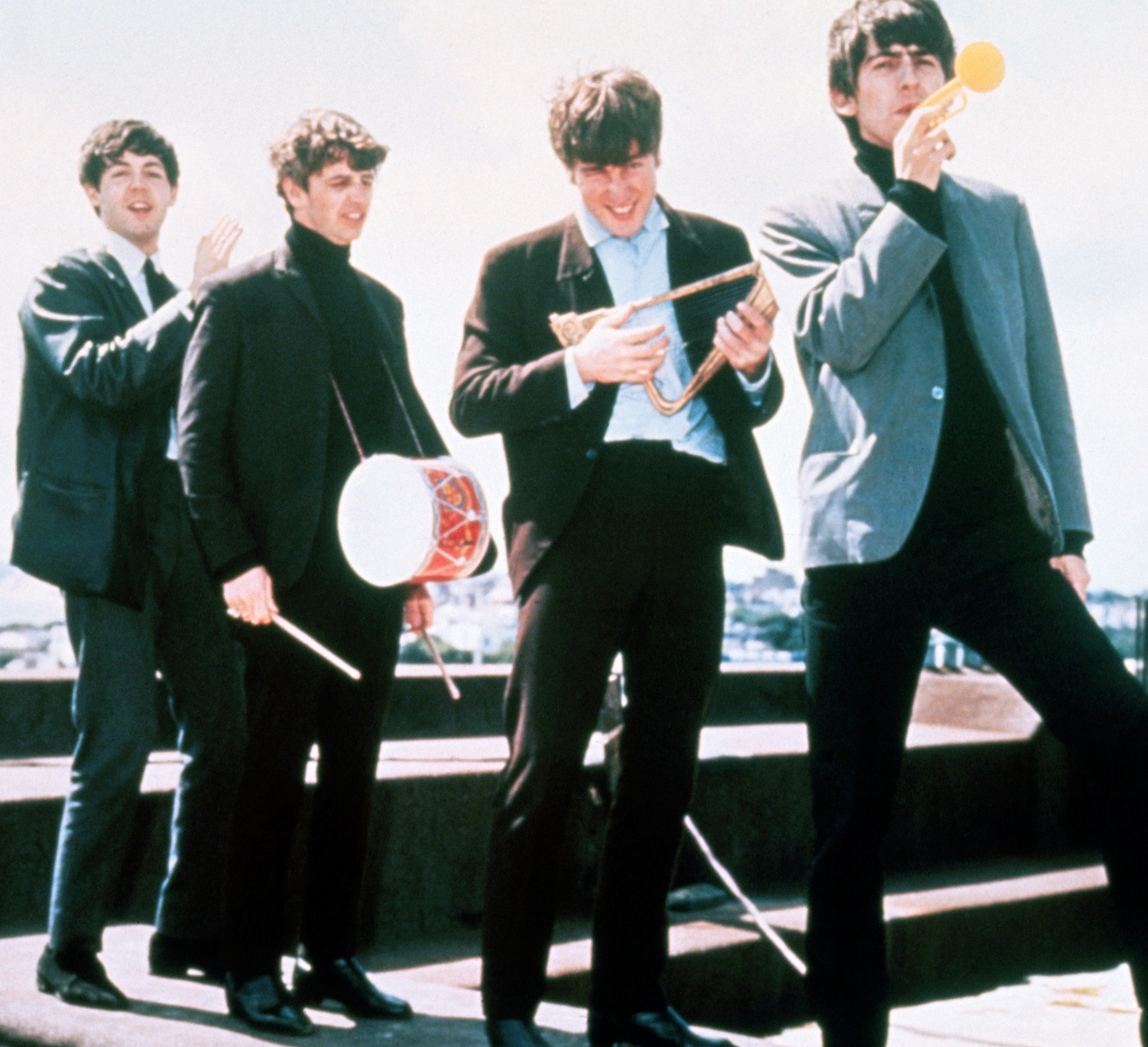 The Beatles’ Paul McCartney, Ringo Starr, John Lennon, and George Harrison on a roof