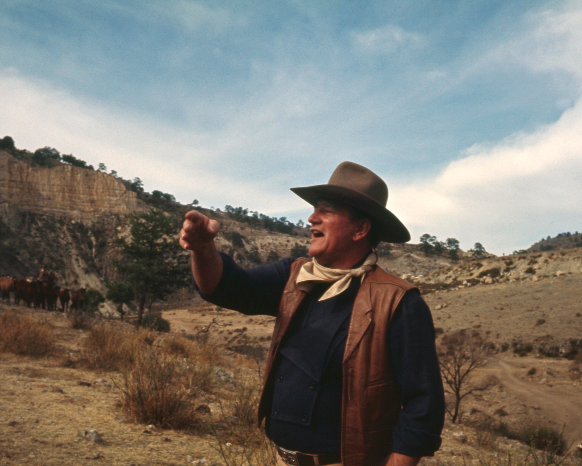 John Wayne, who was conned by his publicist. He's wearing his Western costume as John Elder in 'The Sons of Katie Elder'