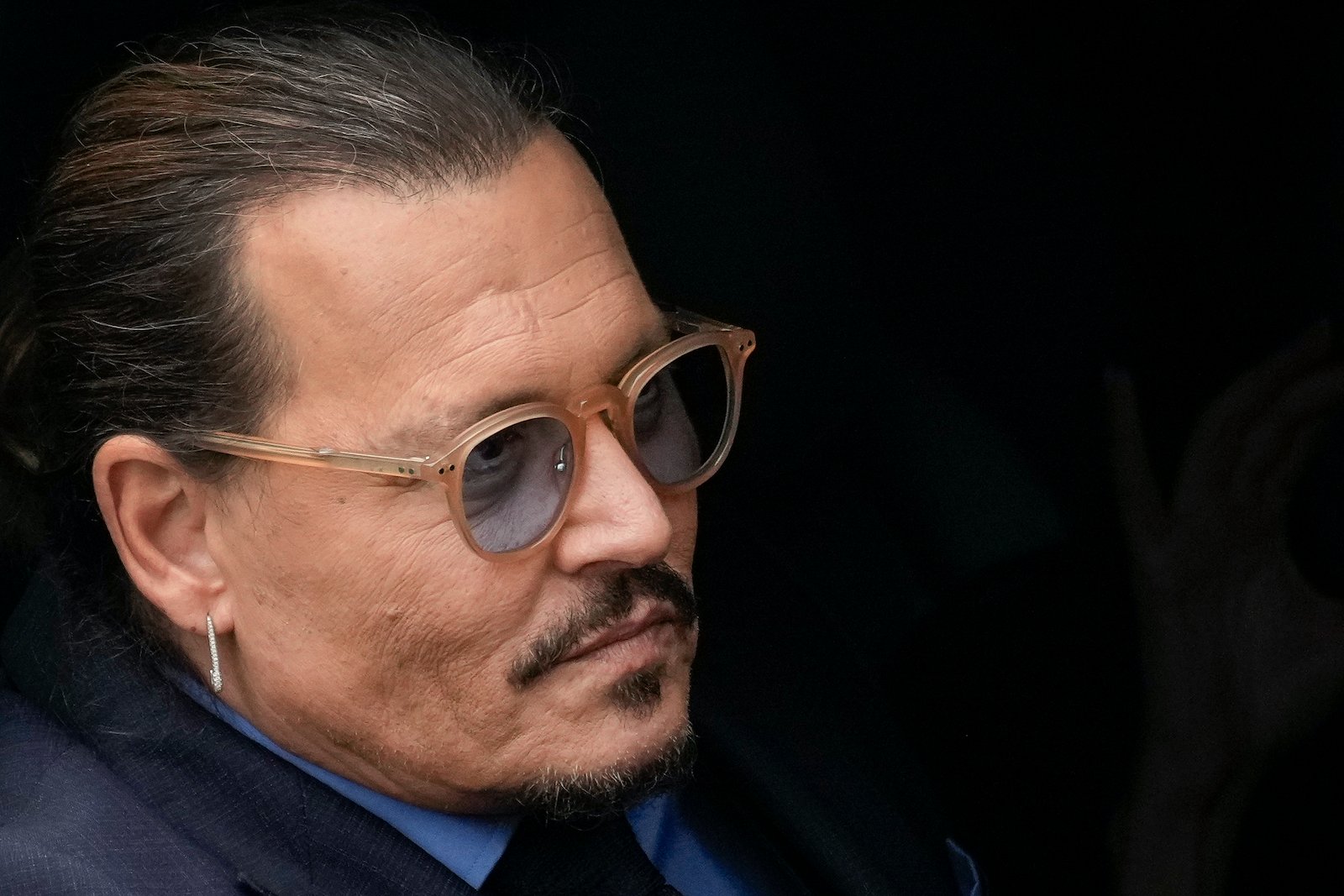 Johnny Depp is photographed in his car leaving the Johnny Depp vs. Amber Heard trial