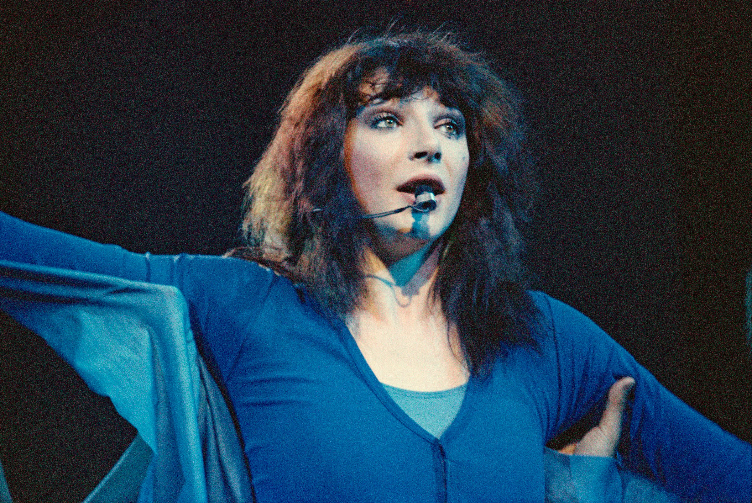 Kate Bush, whose song was featured on 'Stranger Things,' performing wearing blue