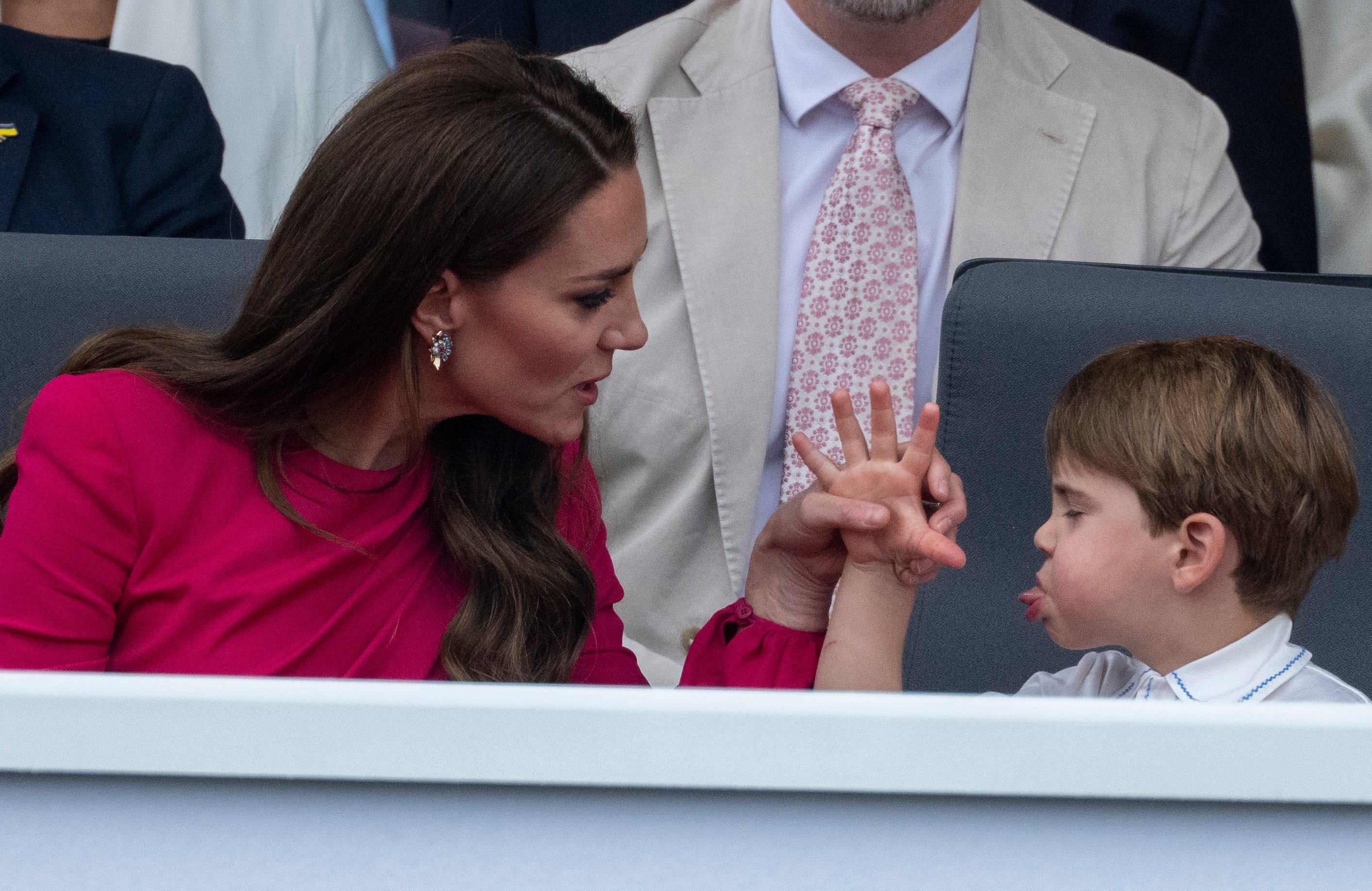 Kate Middleton and Prince Louis seated during the Platinum Pageant