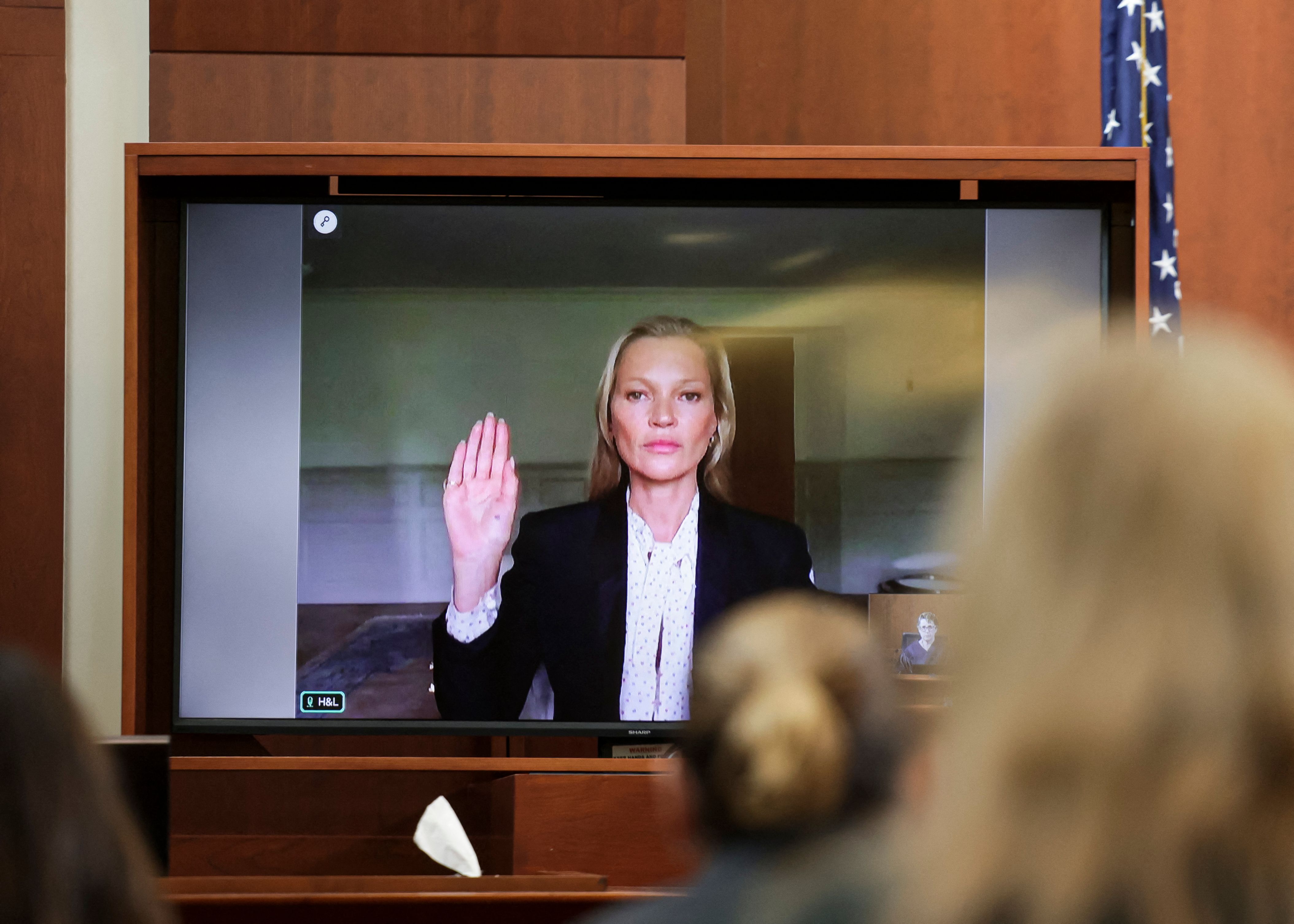Kate Moss is sworn in via video link at the Fairfax County Circuit Courthouse for Johnny Depp's defamation trial