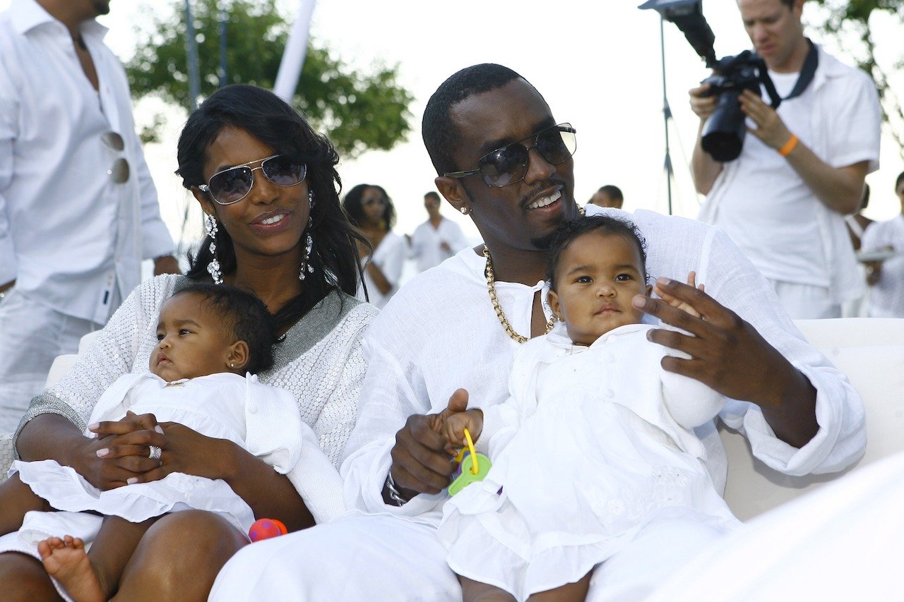 Kim Porter, Diddy, and their twins; Diddy says fatherhood is sometimes difficult since Porter's death