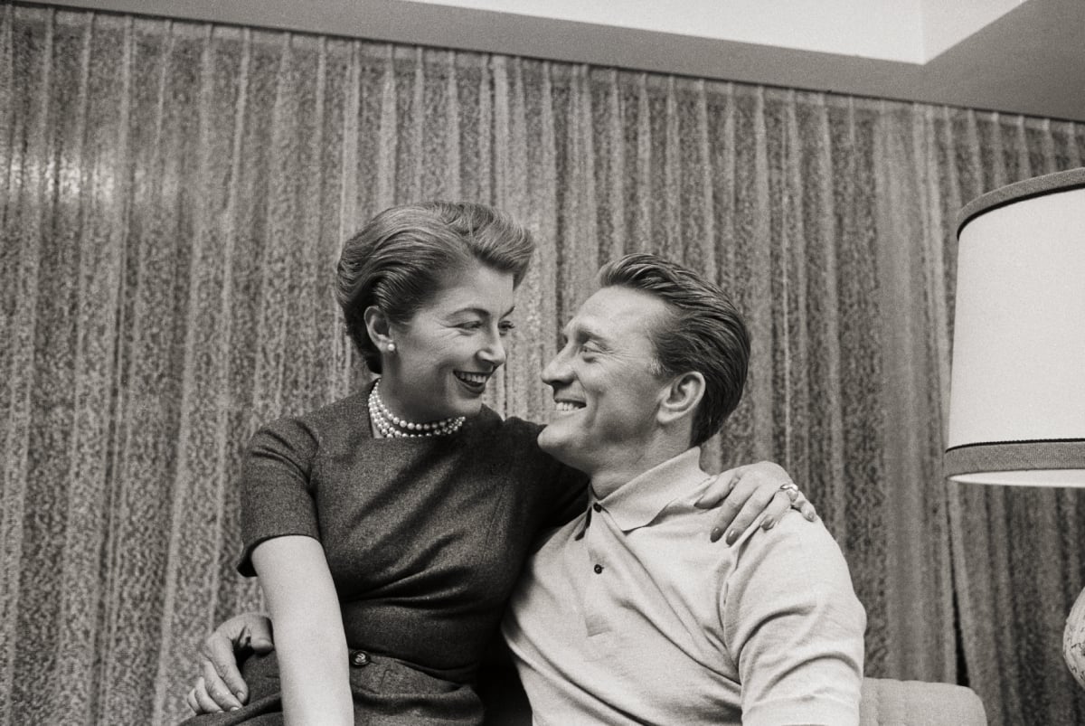 Kirk Douglas and his wife, Anne Buyden, are all smiles after his nomination for an Academy Award by the Motion Picture industry February 18, 1957