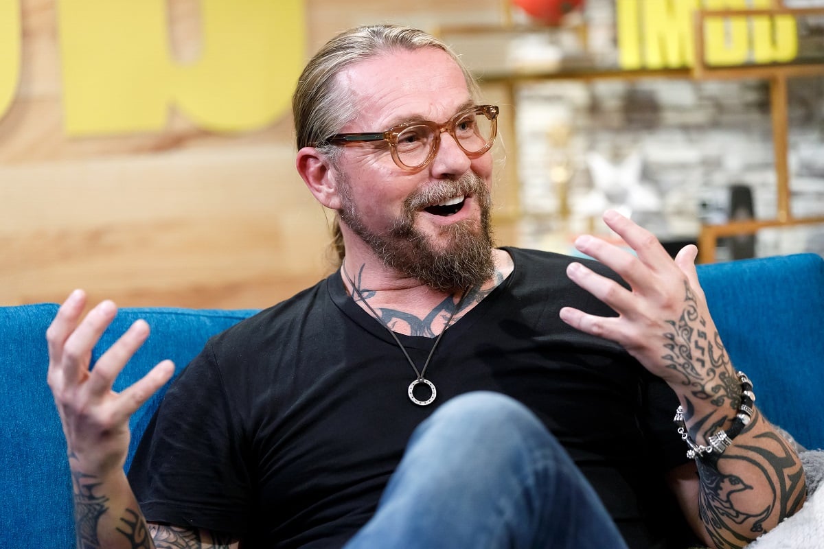 Kurt Sutter smiling while wearing a black t-shirt.