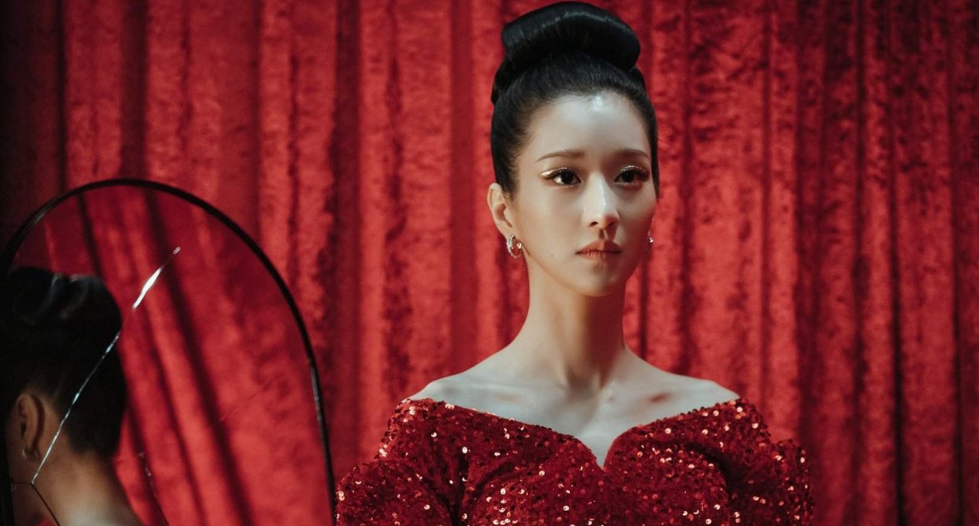 Lee Ra-el in finale of 'Eve' Episode 4 wearing red beaded dress.