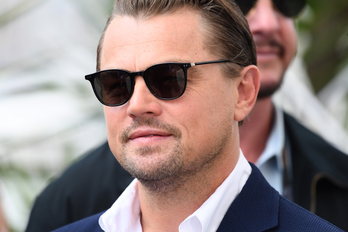 Leonardo DiCaprio posing while wearing sunglasses.