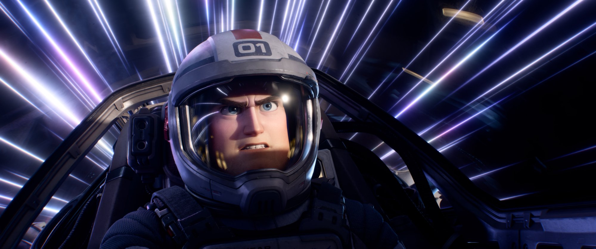 'Lightyear' Buzz Lighter voiced by Chris Evans, who answered what his favorite Pixar movie is. Buzz has a serious look in his space helmet going through hyperspeed.
