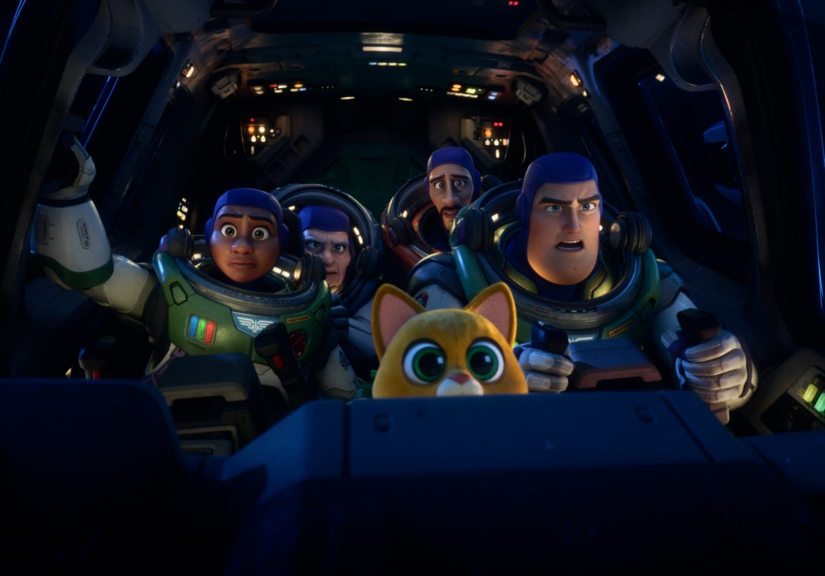 'Lightyear' Izzy Hawthorne (Keke Palmer), Darby Steel (Dale Soules), SOX (Peter Sohn), Mo Morrison (Taika Waititi), Buzz Lightyear (Chris Evans) wearing space ranger uniforms and looking determined inside of the cockpit of a space jet