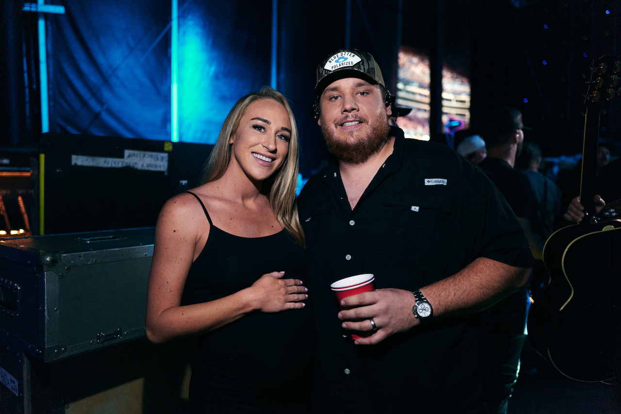 Luke Combs and his wife Nicole Hocking pose together before the birth of their first baby