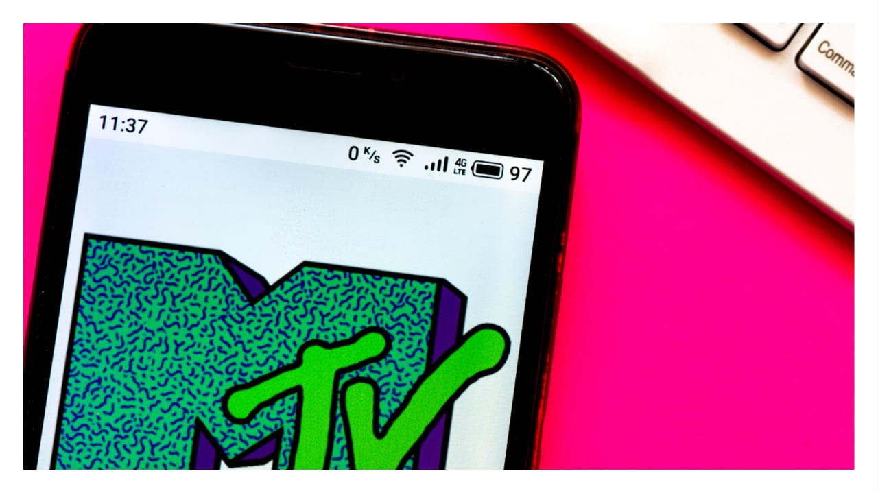 In this photo illustration a MTV logo seen displayed on a smartphone